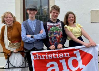 Four teenage siblings, or ‘volun-teens’ distributed Christian Aid Week envelopes house-to-house in Ballyclare, County Antrim