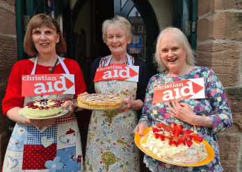 Women with desserts to sell for Christian Aid Week